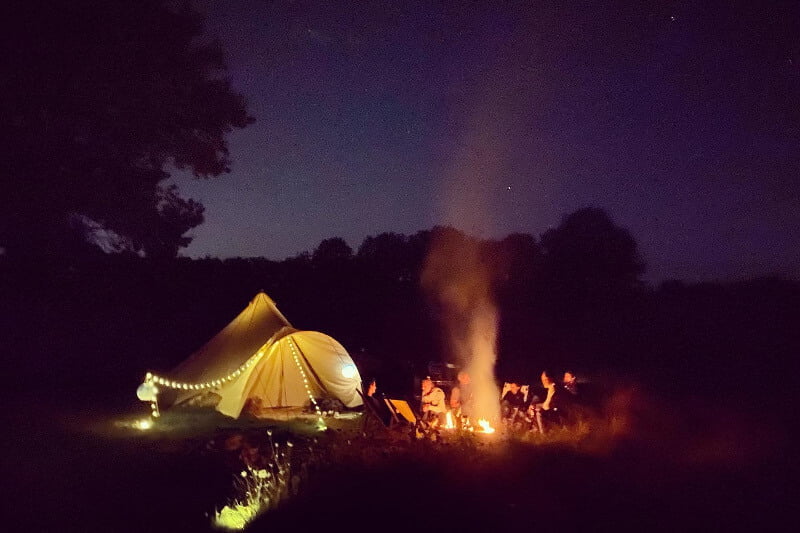 Campfire at night outside Bell Tent Primrose