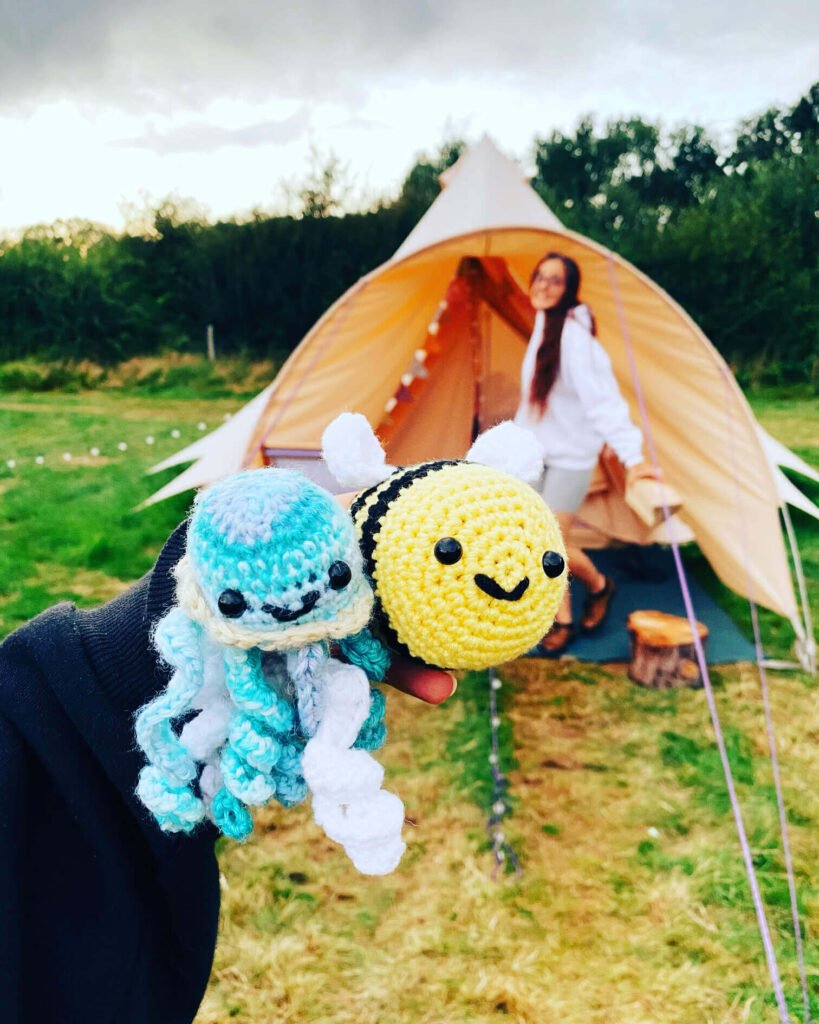 Crochet animals outside bell tent